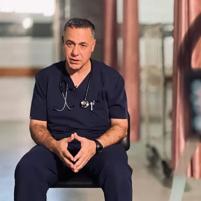 Amnestys logotype Dr Hussam Abu Safiya