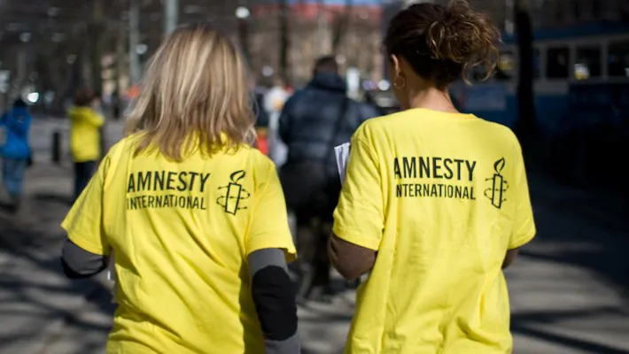 Amnestys logotype KONTAKTA OSS