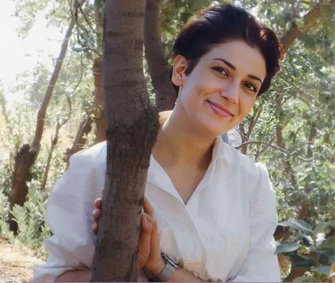 Amnestys logotype Pakhshan Azizi